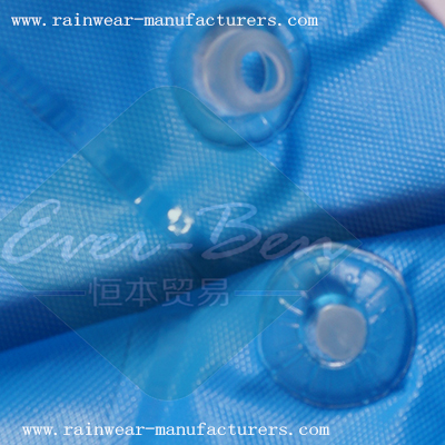 Blue vinyl rain poncho button